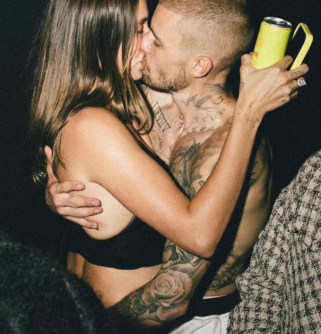 Justin Bieber kisses Hailey during Swag's listening party